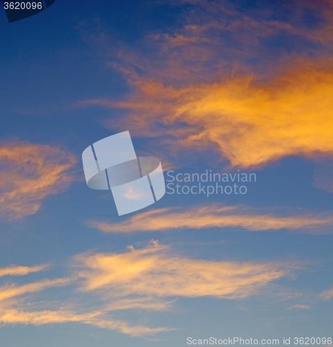 Image of the sunrise in  colored sky white soft clouds and abstract backg