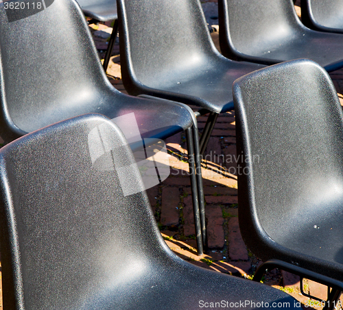 Image of empty seat in italy europe background black  texture