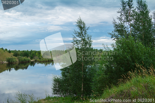 Image of by the river   
