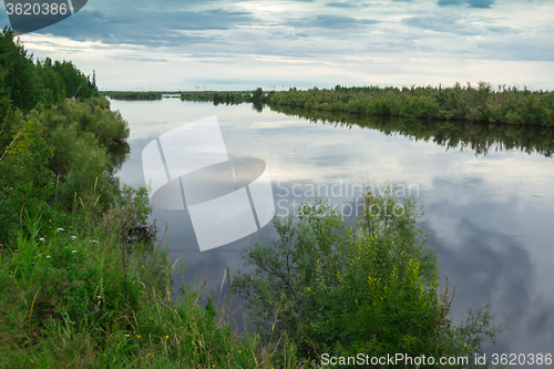 Image of by the river   