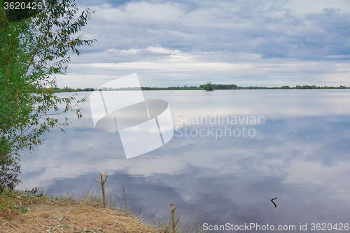 Image of by the river   