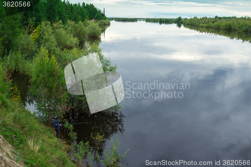 Image of by the river   