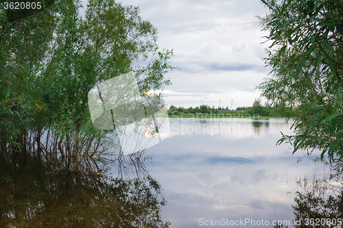 Image of by the river   