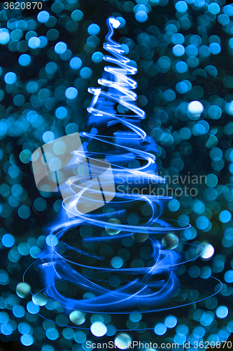 Image of christmas tree with red background
