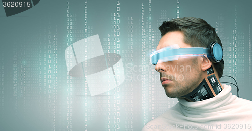 Image of man with futuristic glasses and sensors