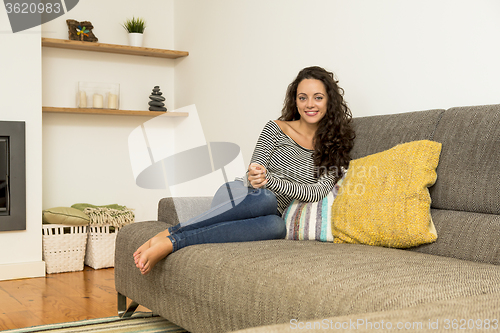 Image of Beautiful woman at home