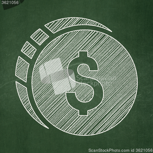 Image of Currency concept: Dollar Coin on chalkboard background
