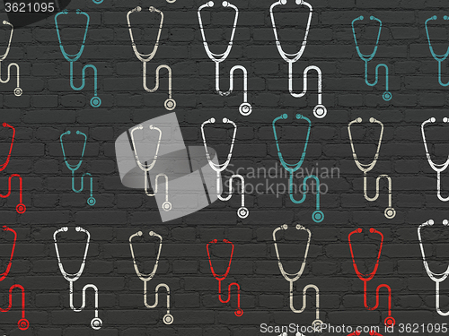 Image of Medicine concept: Stethoscope icons on wall background