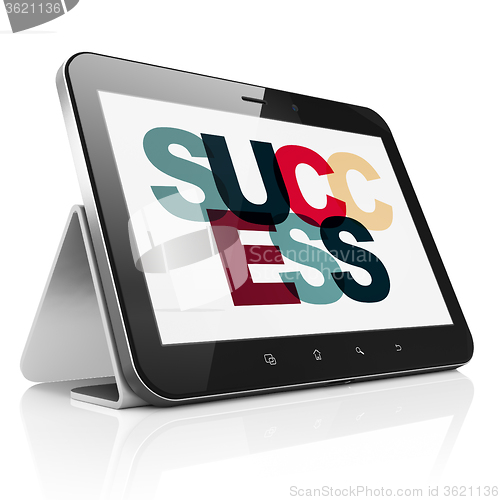 Image of Business concept: Tablet Computer with Success on  display