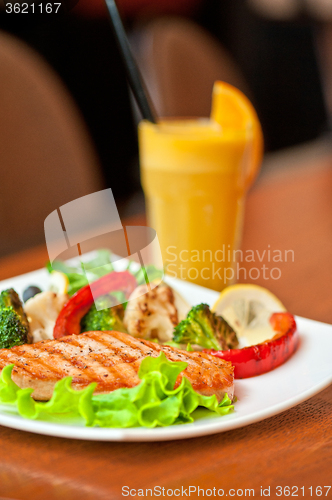 Image of Tasty dish of salmon steak