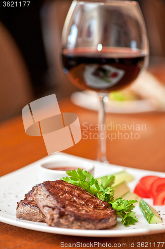 Image of beef meat and wine