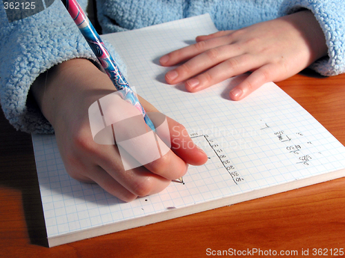 Image of Hands student write