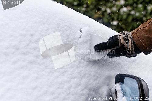 Image of Snowy car