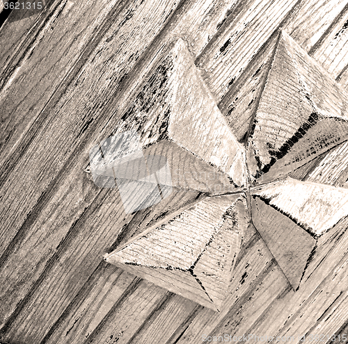 Image of grain texture of a brown antique wooden old door in italy   euro