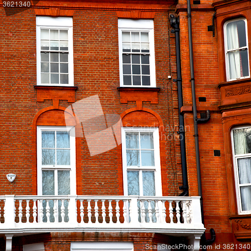Image of window in europe london old red brick wall and      historical 