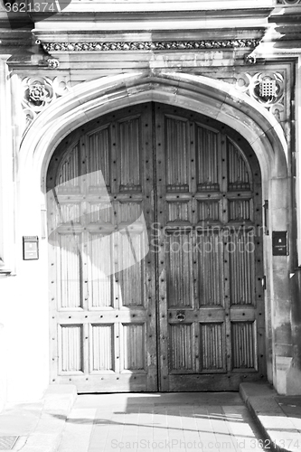 Image of parliament in london old church door and marble antique  wall