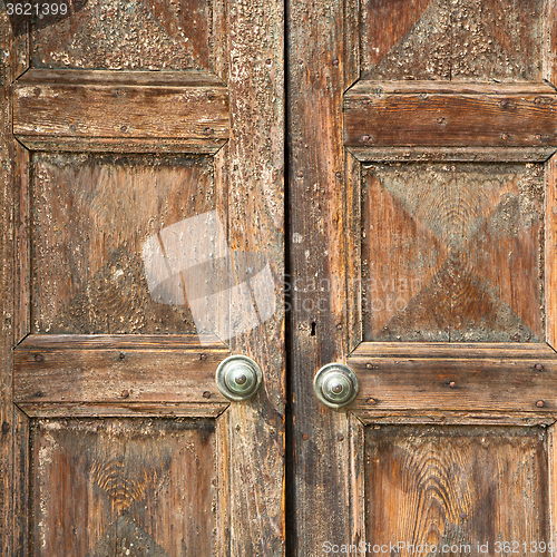 Image of santo an in a  door curch  closed wood lombardy italy  varese