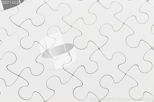 Image of White jigsaw puzzle pattern