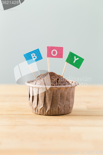 Image of Chocolate muffins with small flag of a word boy