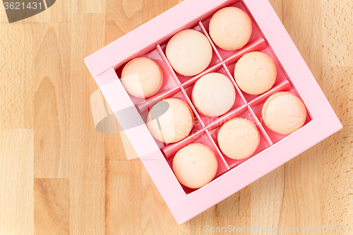 Image of Pink macarons in package