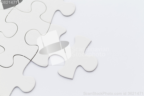 Image of Incomplete puzzle background on white