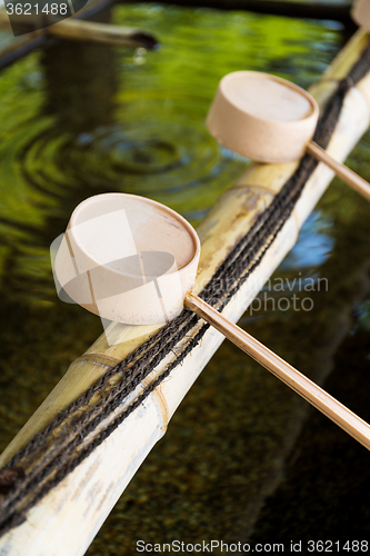 Image of Traditional Japanese bamboo fountain dripping water