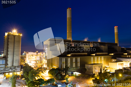 Image of Coal power station and cement plant at night