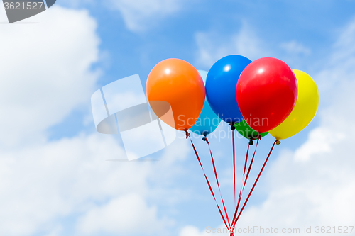 Image of Color balloons wth blue sky