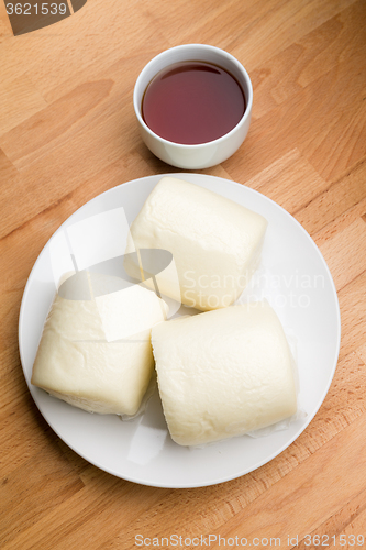 Image of Steamed chinese bun with a cup of tea