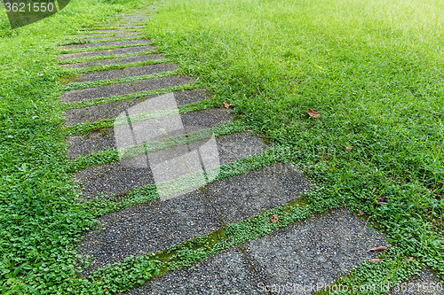 Image of Stone way in green grass