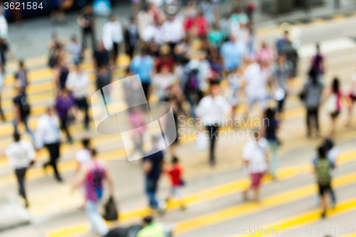 Image of Busy city people on zebra crossing street in Hong Kong