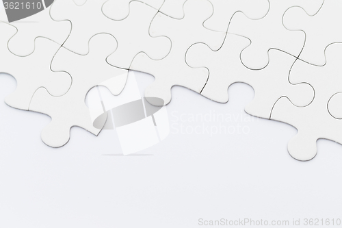 Image of White puzzle on the table