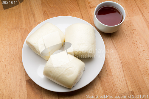 Image of Mantou Chinese steamed bun and tea