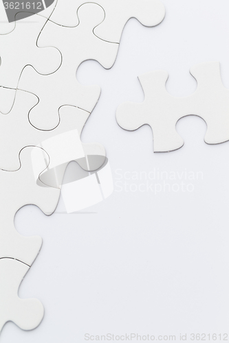 Image of Incomplete puzzle background on white