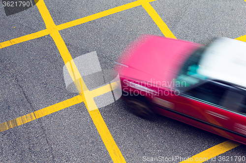 Image of Motion blurred Taxi in Hong Kong