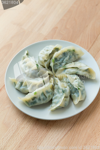 Image of Chinese dumpling on white plate