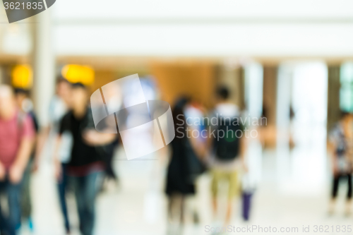 Image of Blur view of crowded people in shopping center