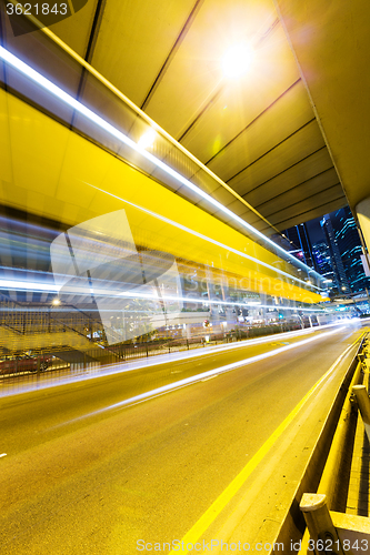 Image of Hong Kong modern landmark building of city road light trail