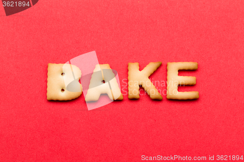 Image of Word bake cookie over the red background