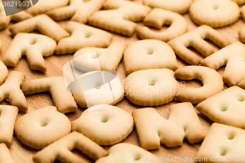 Image of Text Biscuit over the wooden table