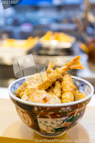 Image of Tempura served over a bowl of rice