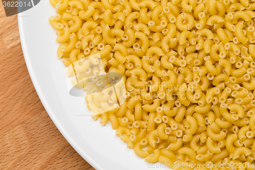 Image of Italian Macaroni Pasta raw food on white plate