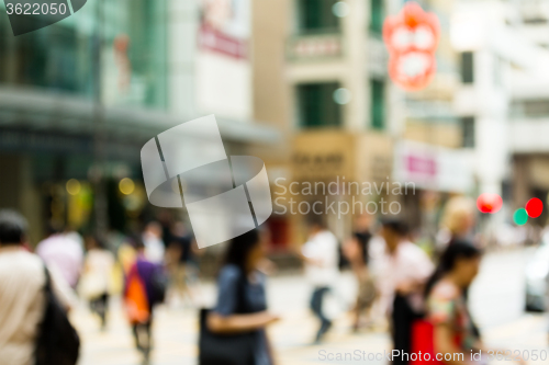 Image of Bokeh view of Crosswalk and pedestrian at street in hong kong