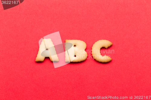 Image of ABC cookie over the red background