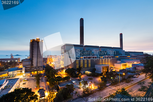 Image of Glow light of petrochemical industry during sunset