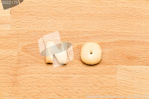 Image of Word no biscuit over the wooden background