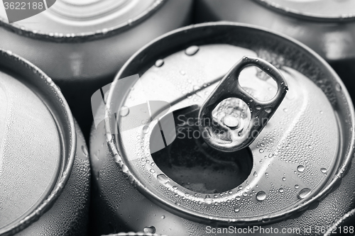 Image of Top of open wet beer can close up