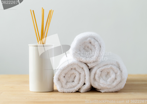 Image of Scented woods and white towel for spa