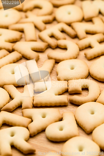 Image of Text Cookie over the wooden table