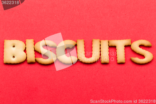Image of Word biscuits over the red background